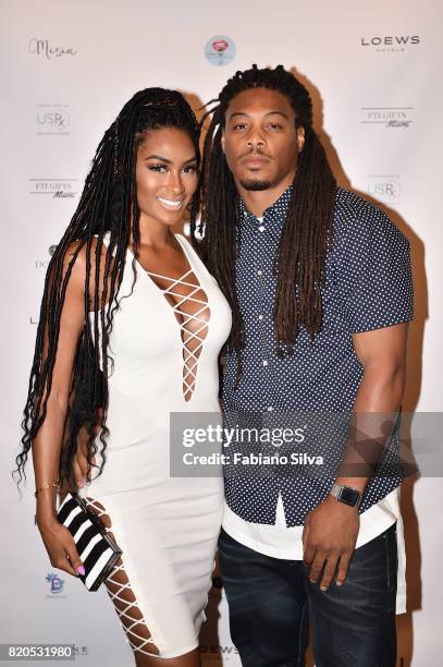 Ashley Wheeler and Philip Wheeler attend the Keva J Swimwear S/S 2018 fashion show at Loews Miami Beach Hotel on July 21, 2017 in Miami Beach,...