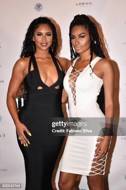 Darnell Nicole and Ashley Wheeler attend the Keva J Swimwear S/S 2018 fashion show at Loews Miami Beach Hotel on July 21, 2017 in Miami Beach,...