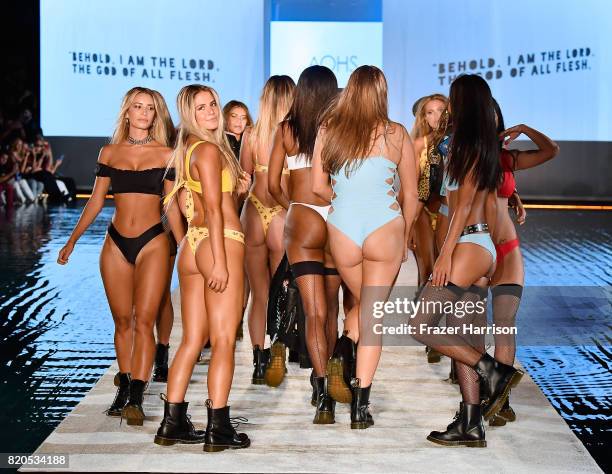Models walk the runway during the SWIMMIAMI KAOHS 2018 Collection fashion show at WET Deck at W South Beach on July 21, 2017 in Miami Beach, Florida.