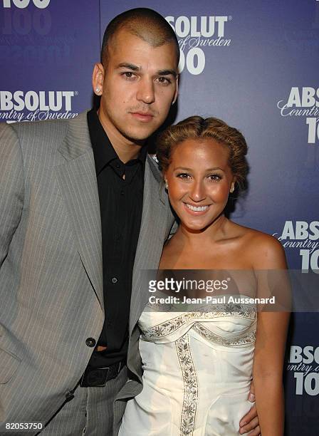 Personality Rob Kardashian and singer Adrienne Bailon of the Cheetah Girls arrive at the "Glow in the Dark Tour 2008" party ignited by Absolute 100...