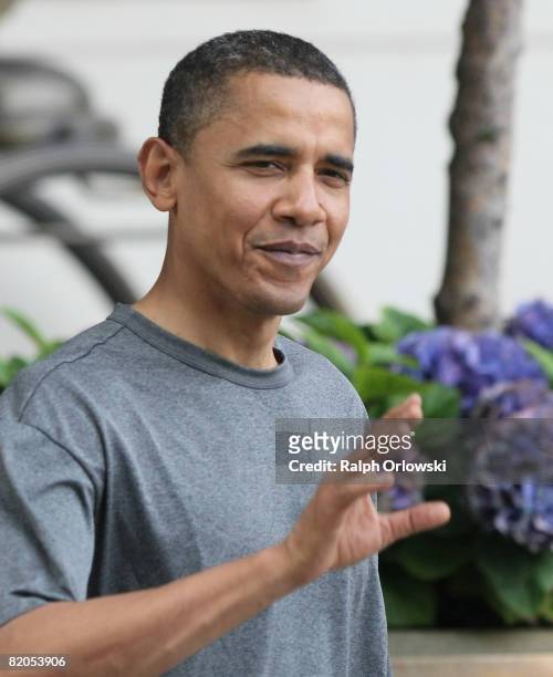 Presumptive Democratic presidential candidate Sen. Barack Obama waves as he leaves Ritz Carlton hotel on July 24, 2008 in Berlin, Germany. Sen....