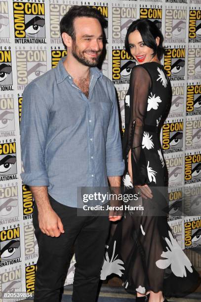 Actors Charlie Cox and Krysten Ritter attend 'Marvel's The Defenders' press line at Comic Con on July 21, 2017 in San Diego, California.