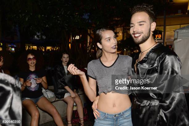 Models prepare at the "Tankovitz on Lincoln Road" event presented by DIVE Swim Week on July 21, 2017 in Miami, Florida.