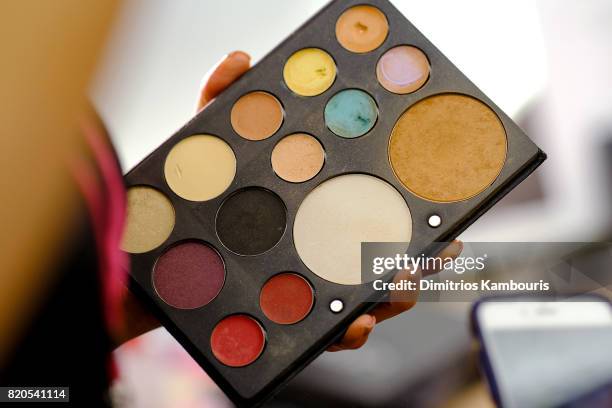 View of make-up backstage during the SWIMMIAMI KAOHS 2018 Collection fashion show at WET Deck at W South Beach on July 21, 2017 in Miami Beach,...