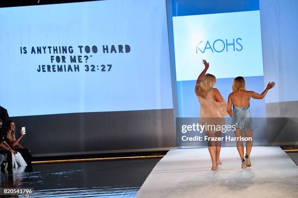 Fashion designers walk the runway during the SWIMMIAMI KAOHS 2018 Collection fashion show at WET Deck at W South Beach on July 21, 2017 in Miami...