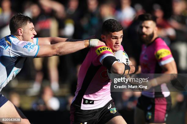 Nathan Cleary of the Panthers is tackled during the round 20 NRL match between the Penrith Panthers and the Gold Coast Titans at Pepper Stadium on...