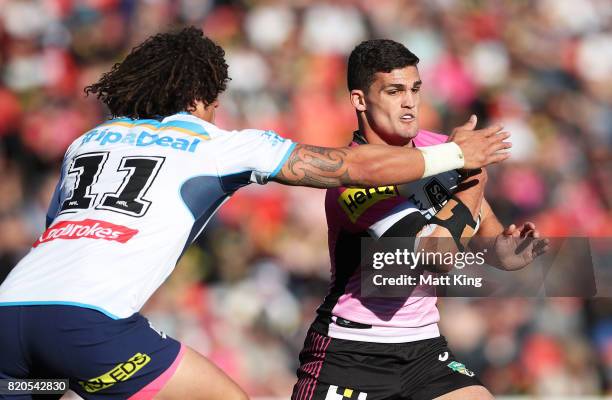 Nathan Cleary of the Panthers is tackled during the round 20 NRL match between the Penrith Panthers and the Gold Coast Titans at Pepper Stadium on...