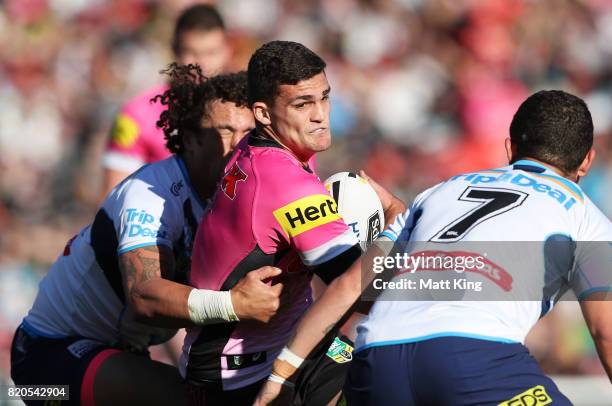 Nathan Cleary of the Panthers is tackled during the round 20 NRL match between the Penrith Panthers and the Gold Coast Titans at Pepper Stadium on...