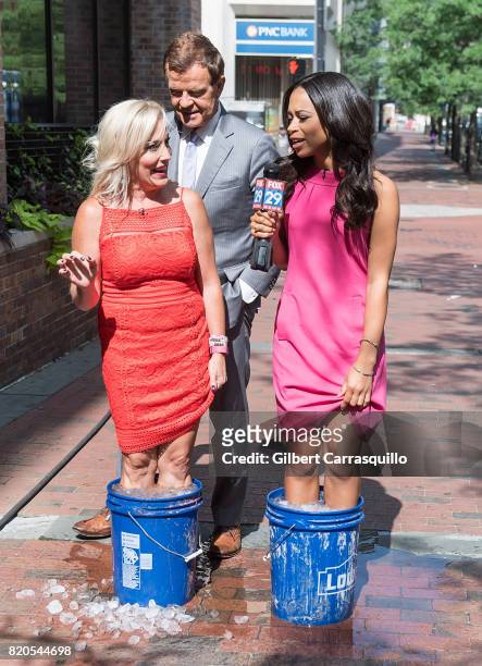 News Anchor Jennaphr Frederick and Co-hosts of Good Day Philadelphia Mike Jerrick and Alex Holley are seen during a segment of Fox 29's 'Good Day' at...