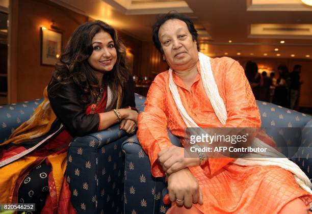 Indian Ghazal singers Mitali Singh with her husband Bhupinder Singh attend the Ghazal music festival "Khazana", raising funds for cancer patients, in...