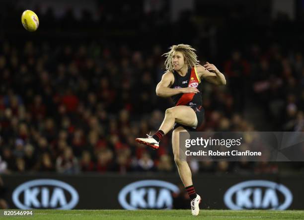 Dyson Heppell of the Bombers kicks the ball during the round 18 AFL match between the Essendon Bombers and the North Melbourne Kangaroos at Etihad...