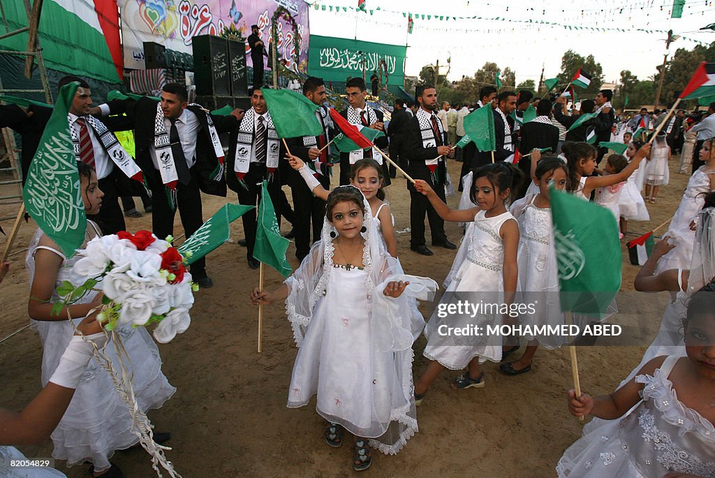 Palestinian girls dressed as bridesmaids