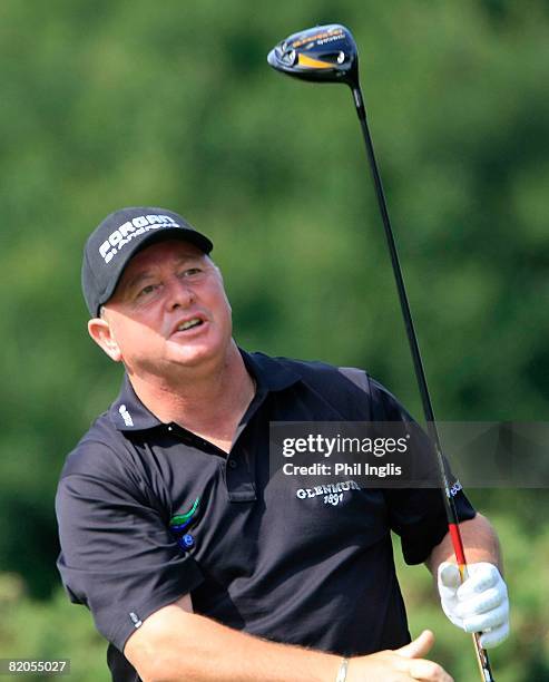 Ian Woosnam of Wales watches his drive on the 13th tee during the first round of the Senior Open Championships at Royal Troon on July 24, 2008 in...