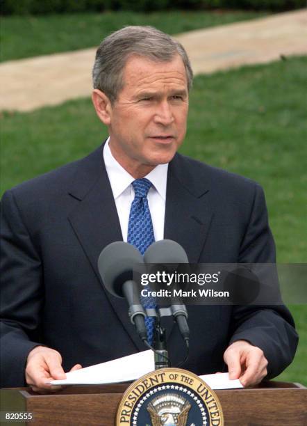 President George W. Bush makes a statement to the press April 2, 2000 at the White House regarding the detention of a U.S. Military plane and its...