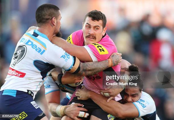 Reagan Campbell-Gillard of the Panthers is tackled during the round 20 NRL match between the Penrith Panthers and the Gold Coast Titans at Pepper...