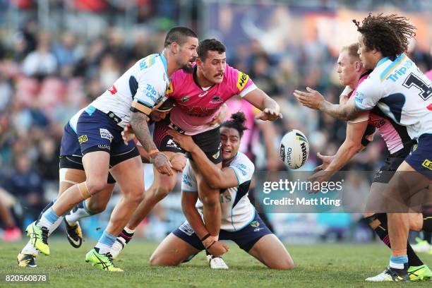 Reagan Campbell-Gillard of the Panthers is tackled during the round 20 NRL match between the Penrith Panthers and the Gold Coast Titans at Pepper...