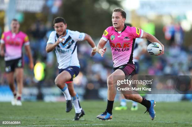 Matt Moylan of the Panthers sprints away to score a try during the round 20 NRL match between the Penrith Panthers and the Gold Coast Titans at...