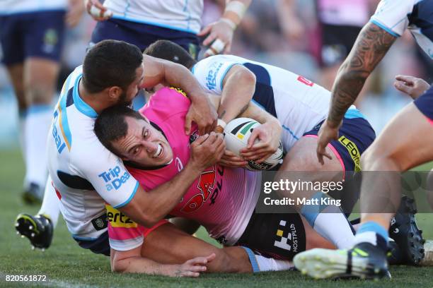 Isaah Yeo of the Panthers is held up just short of the line during the round 20 NRL match between the Penrith Panthers and the Gold Coast Titans at...