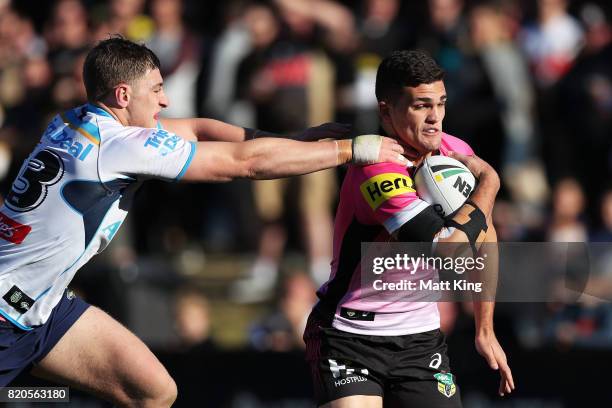 Nathan Cleary of the Panthers is tackled during the round 20 NRL match between the Penrith Panthers and the Gold Coast Titans at Pepper Stadium on...