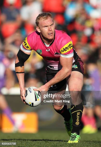 Peter Wallace of the Panthers passes during the round 20 NRL match between the Penrith Panthers and the Gold Coast Titans at Pepper Stadium on July...