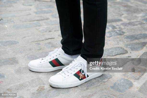 Model Jack Chambers wears Gucci trainers on day 3 of London Collections: Men on June 11, 2017 in Paris, France.