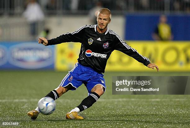 Midfielder David Beckham of L.A. Galaxy crosses the ball during the 2008 Pepsi MLS All Star Game between the MLS All Stars and West Ham United at BMO...