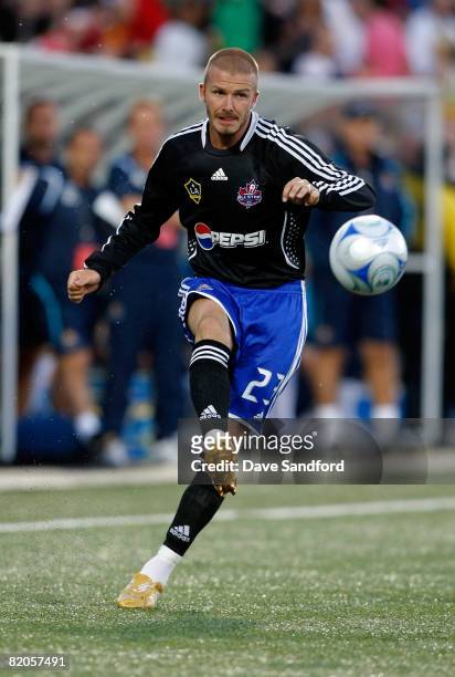 Midfielder David Beckham of L.A. Galaxy crosses the ball during the 2008 Pepsi MLS All Star Game between the MLS All Stars and West Ham United at BMO...