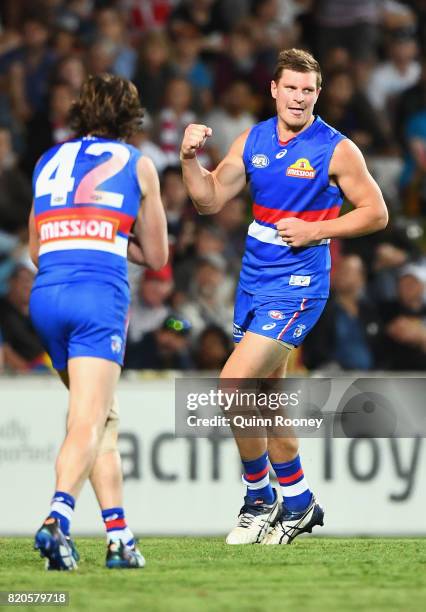 Jack Redpath of the Bulldogs celebrates kicking a goal during the round 18 AFL match between the Western Bulldogs and the Gold Coast Suns at Cazaly's...