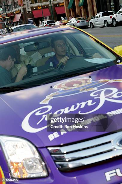 Driver Jamie McMurray drives as the designated driver during the Crown Royal "Safe Rides Home" event July 24, 2008 in Indianapolis, Indiana.