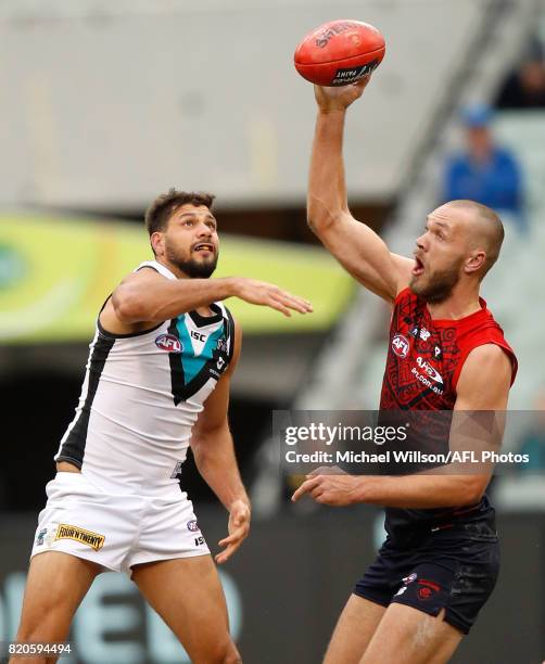 Paddy Ryder of the Power and Max Gawn of the Demons compete in a ruck contest during the 2017 AFL round 18 match between the Melbourne Demons and the...