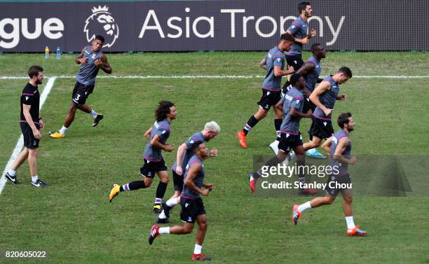 Crystal Palace warms up prior to kick off during the Premier League Asia Trophy match between West Brom and Crystal Palace at Hong Kong Stadium on...