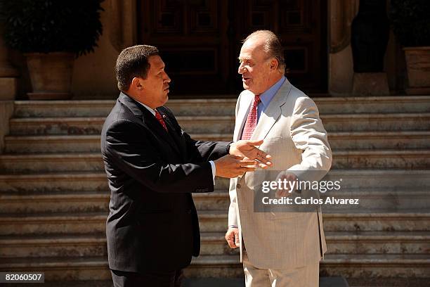 King Juan Carlos of Spain receives Venezuelan President Hugo Chavez on July 25, 2008 at the Marivent Palace in Palma de Mallorca, Spain.