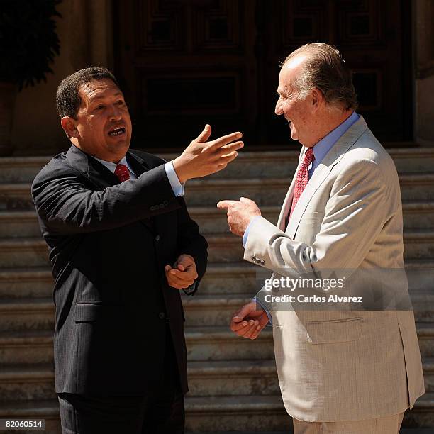 King Juan Carlos of Spain receives Venezuelan President Hugo Chavez on July 25, 2008 at the Marivent Palace in Palma de Mallorca, Spain.