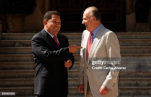 King Juan Carlos of Spain receives Venezuelan President Hugo Chavez on July 25, 2008 at the Marivent Palace in Palma de Mallorca, Spain.