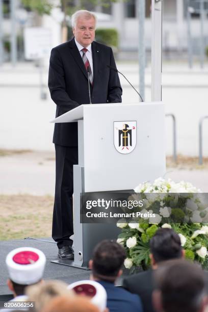 Bavarian Governor Horst Seehofer speaks at an event to commemorate the first anniversary of the shooting spree that one year ago left ten people...