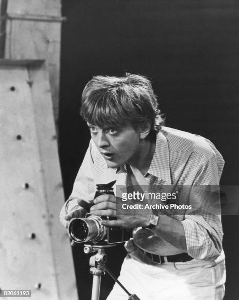 English actor David Hemmings stars as a photographer in the film 'Blowup', 1966.