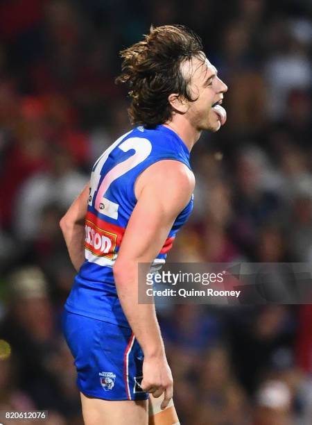 Liam Picken of the Bulldogs celebrates kicking a goal during the round 18 AFL match between the Western Bulldogs and the Gold Coast Suns at Cazaly's...