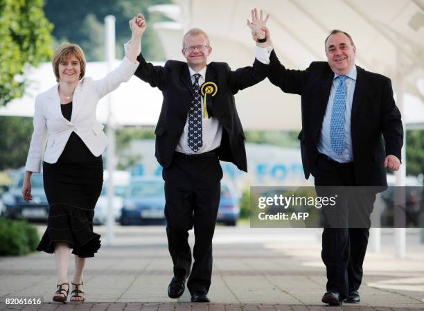 Members of the Scottish National Party , Nicola Sturgeon MSP , victorious candidate at Glasgow East John Mason and Scottish First Minister Alex...