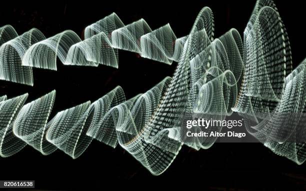 light painting: inter-connection - bezig met verbinden stockfoto's en -beelden