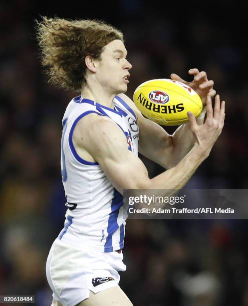 Ben Brown of the Kangaroos marks the ball during the 2017 AFL round 18 match between the Essendon Bombers and the North Melbourne Kangaroos at Etihad...