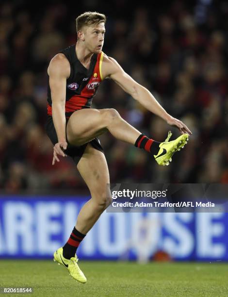 Jayden Laverde of the Bombers kicks the ball during the 2017 AFL round 18 match between the Essendon Bombers and the North Melbourne Kangaroos at...