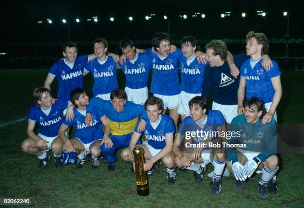 Everton celebrate with the Canon First Division Championship trophy after their match against West Ham United at Goodsion Park, May 8th 1985. Everton...