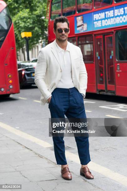 Model David Gandy wears Finlay and Co sunglasses, Ralph lauren jacket, A days March polo shirt, Oliver Spencer trousers and David Preston shoes on...