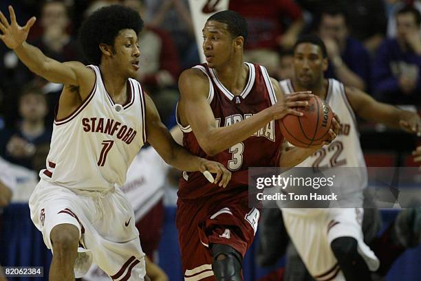 Josh Childress of Stanford covers Kennedy Wilson of Alabama. Alabama defeats Stanford 70-67 during the second round of the 2004 Men's NCAA Basketball...
