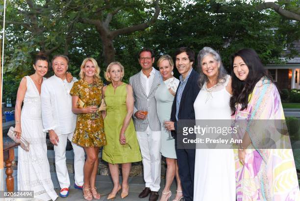 Joan Hornig and guests attend Hamptons Event to Celebrate FIT at The Hornig Residence on July 21, 2017 in Water Mill, New York.