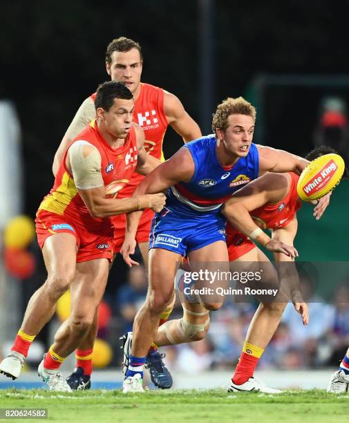 Mitch Wallis of the Bulldogs competes for the ball during the round 18 AFL match between the Western Bulldogs and the Gold Coast Suns at Cazaly's...