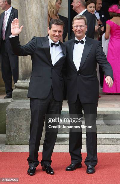 Guido Westerwelle and partner Michael Mronz arrive for the 'Parsifal' premiere of the Richard Wagner festival on July 25, 2008 in Bayreuth, Germany.