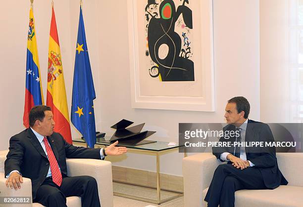 Venezuelan President Hugo Chavez and Spanish Prime Minister Jose Luis Rodriguez Zapatero talk during his visit to the Moncloa Palace in Madrid on...