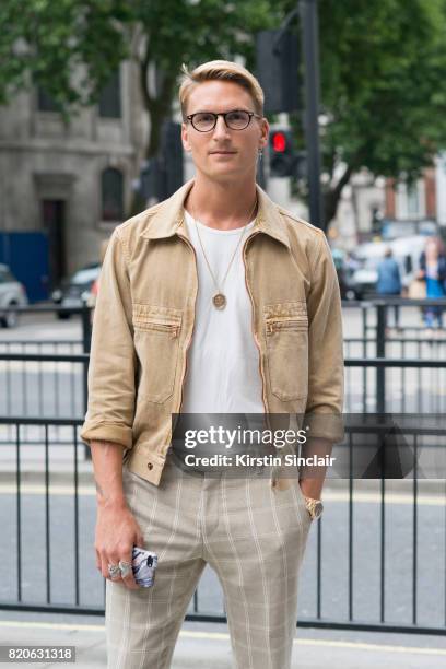 Model and Made in Chelsea star Oliver Proudlock wears River Island trousers, Zara T shirt, Private White jacket and Tom Davies glasses on day 3 of...