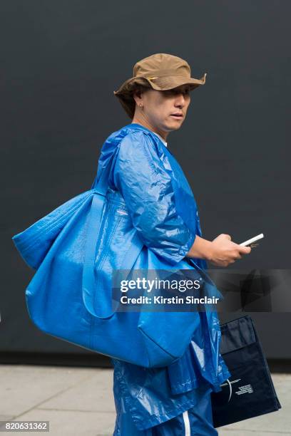 Guest wears a Balenciaga on day 3 of London Collections: Men on June 12, 2017 in Paris, France.